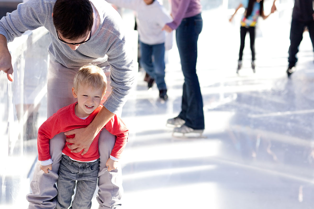 Father & Young Son Skate Together
