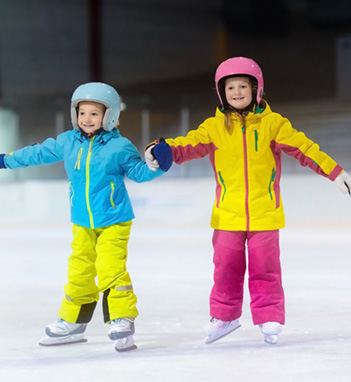 Two Young Kids Skating